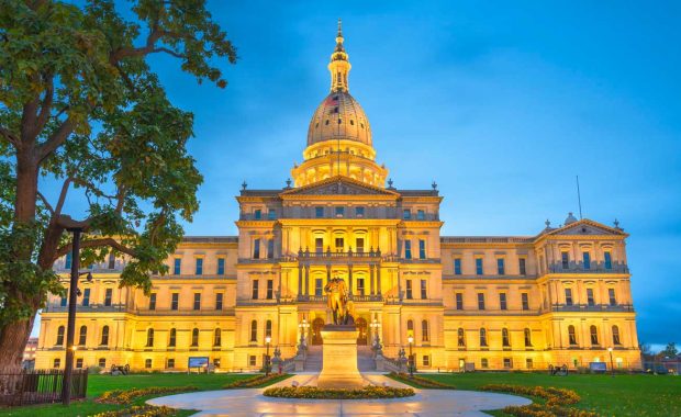 the Michigan state capitol building at night