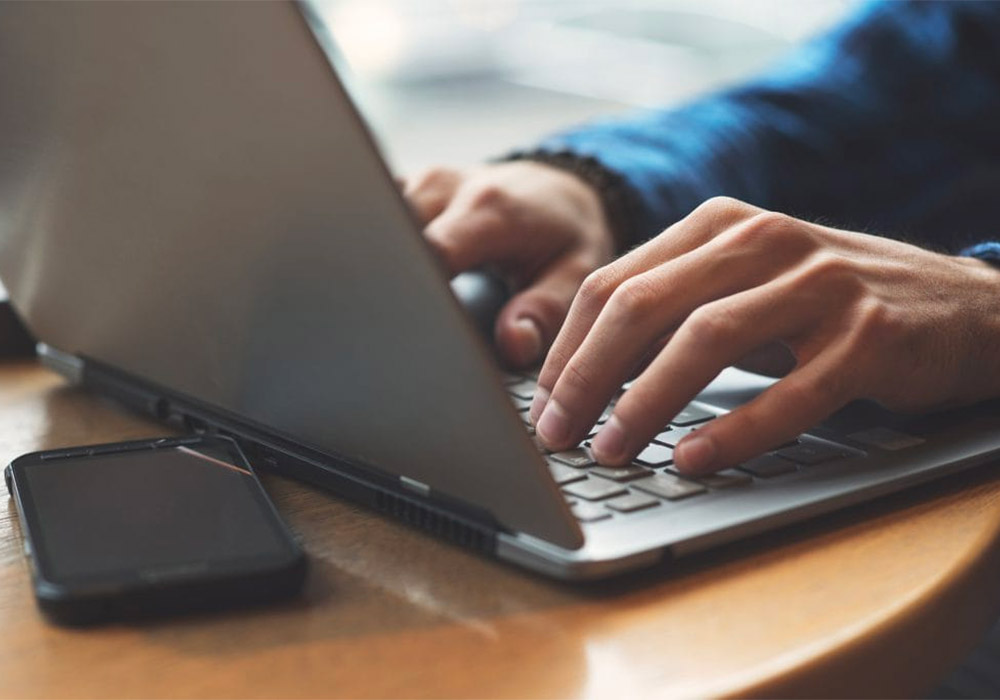 a police officer using the OpenFox® sex offender registry system