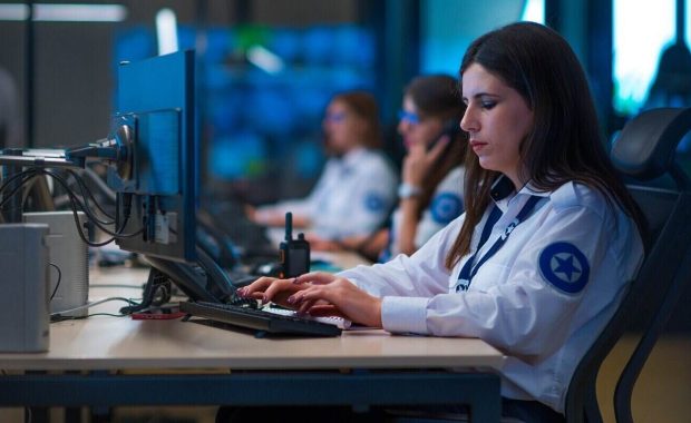 police officer working in computer system