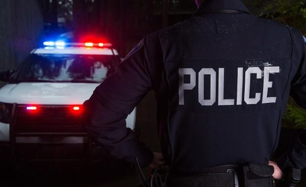 police officer near car