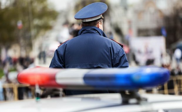 Police officer outside vehicle