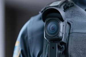 body camera attached to uniform, showcasing technology in law en