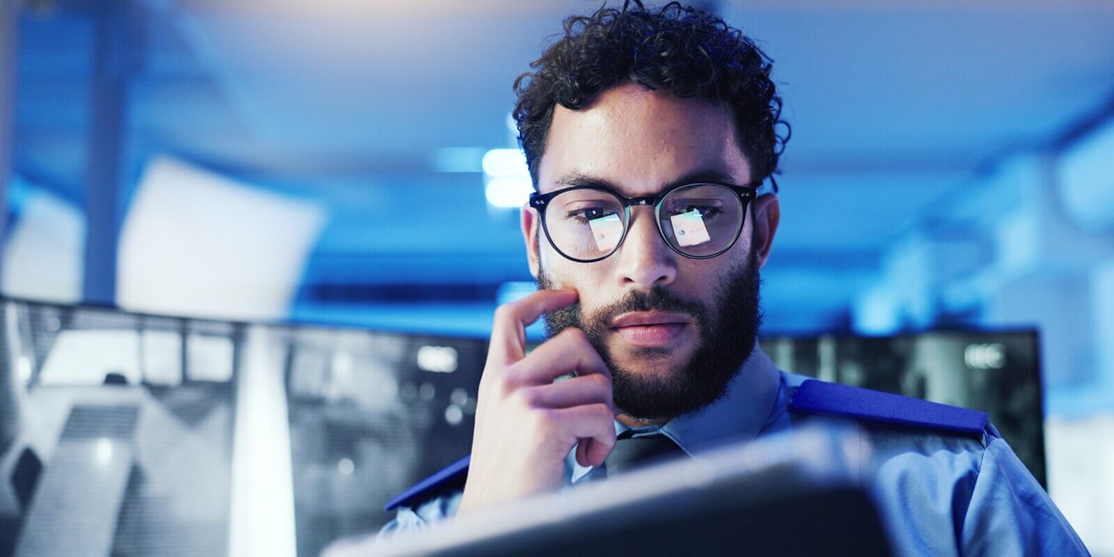 tablet and thinking with man in office at night for monitoring
