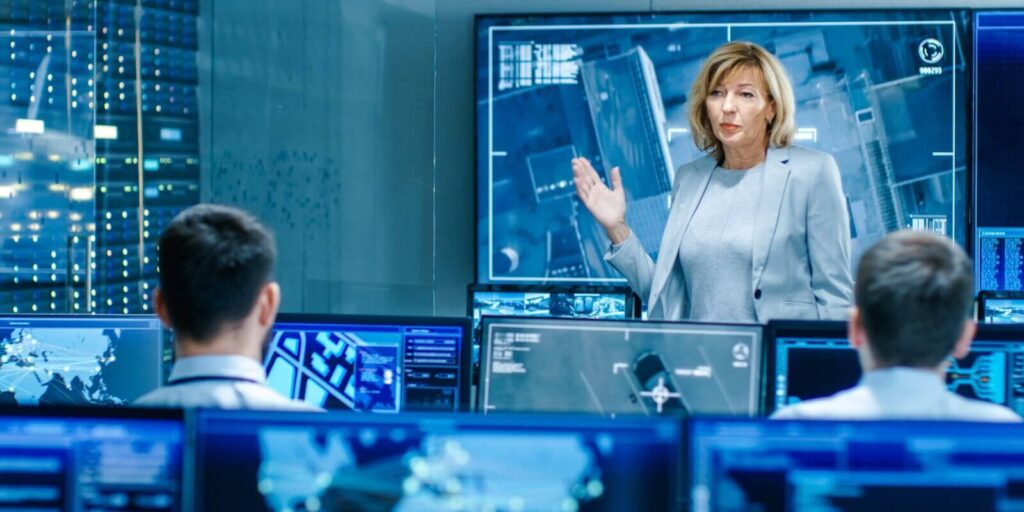 in the government surveillance facility team of officers organize interception plan with help of satellite navigation